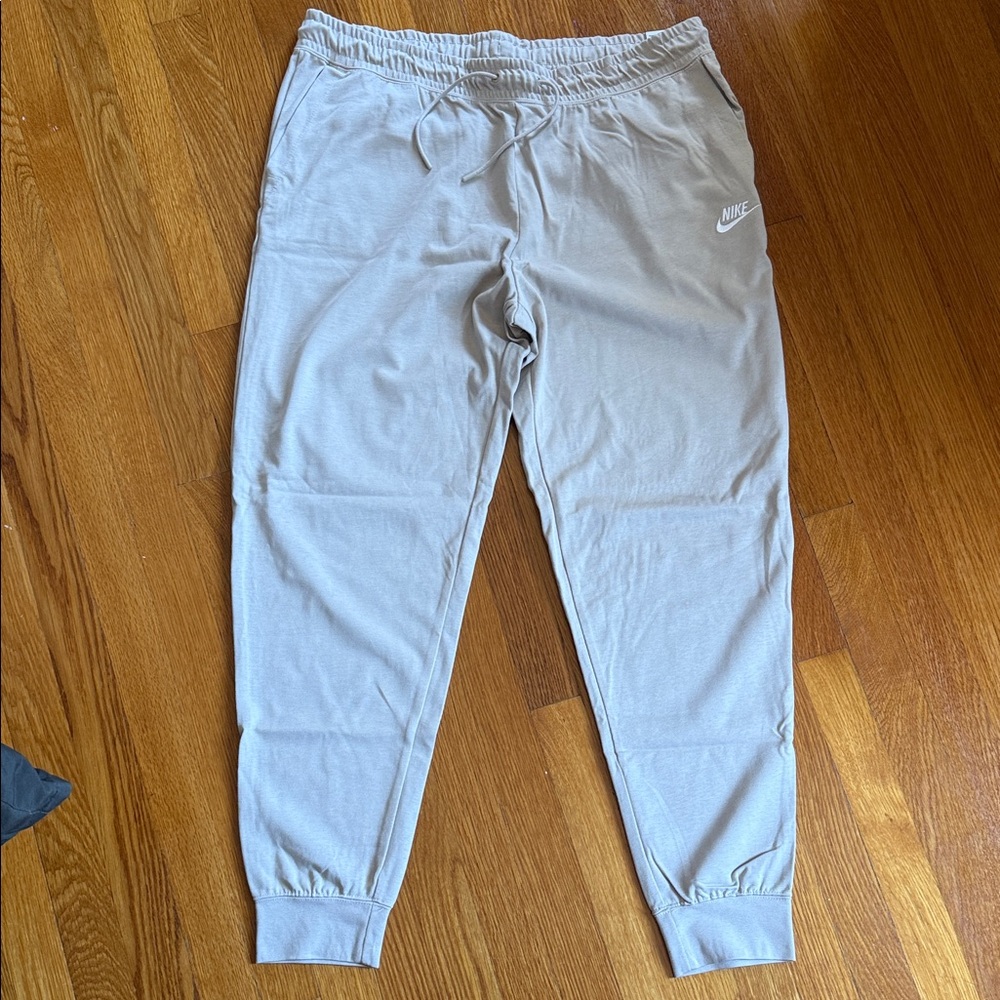 Nike Light Tan Athletic Joggers with White Swoosh